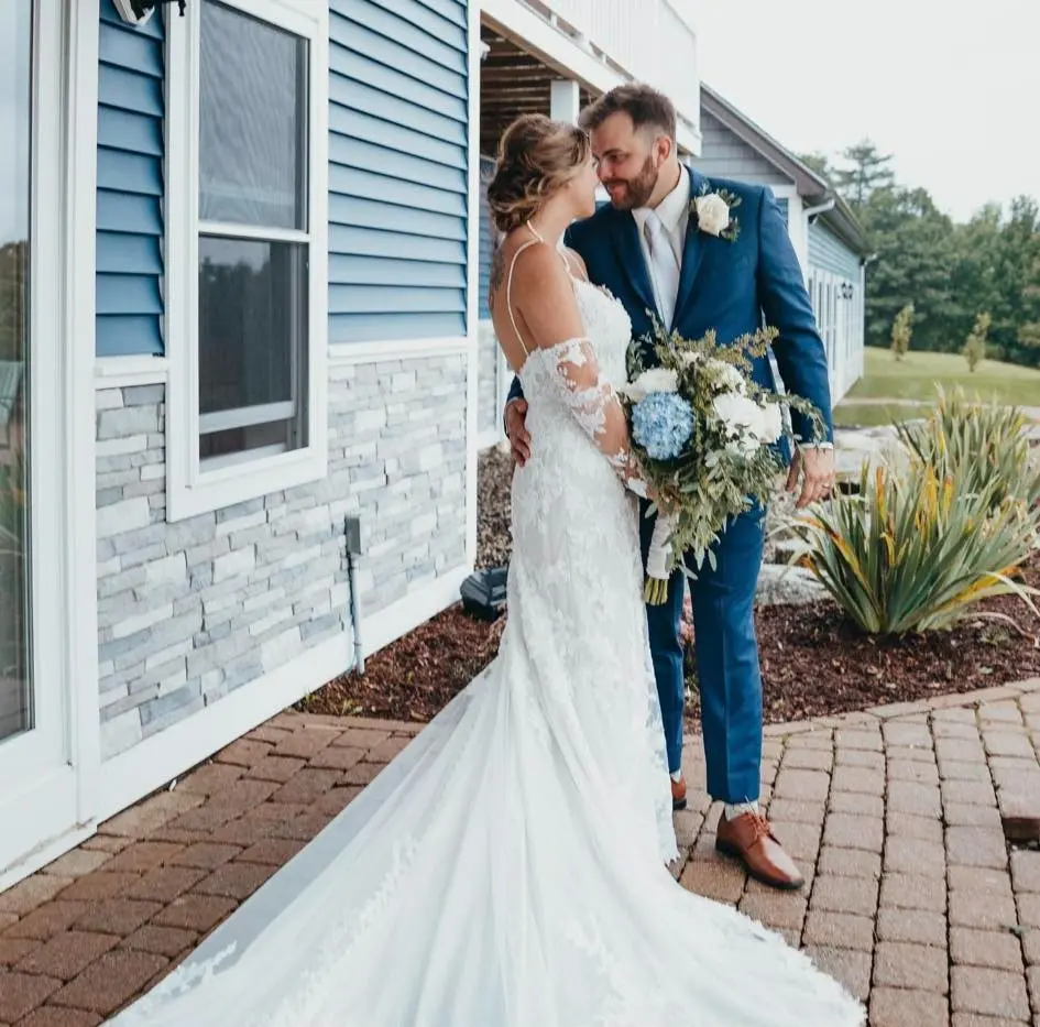 Bride and groom outside the estate